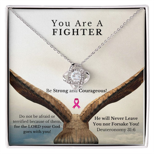 Deuteronomy 31:6 scripture behind a beautiful pendant embellished with premium cubic zirconia crystals. Encourage a love one that they are a fighter through cancer awareness month.
